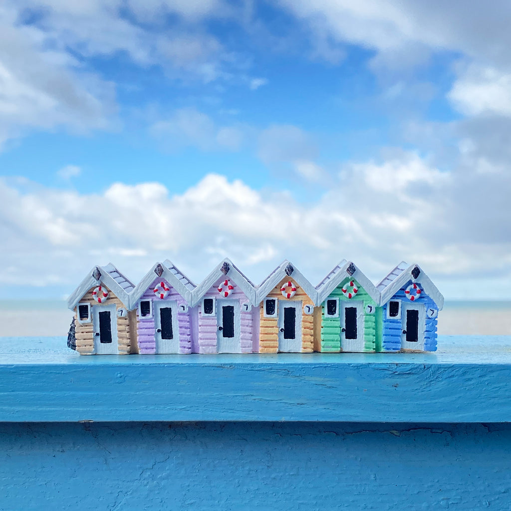 Pastel Rainbow Beach Hut Row